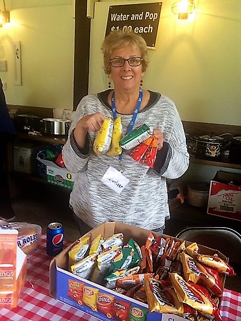 Lion Mary, volunteers to help selling snacks at a recent event for a non-profit.